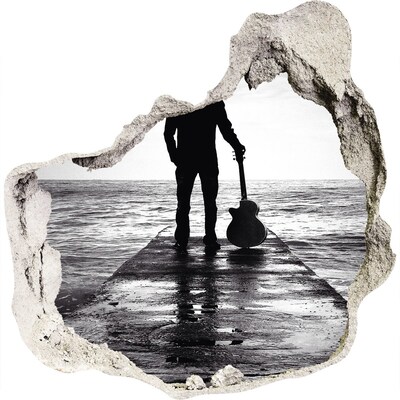 Fototapeta dziura na ścianę Muzyk na molo