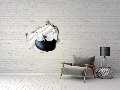 Dziura 3d fototapeta naklejka Motyl na kamieniu w zenowej scenerii