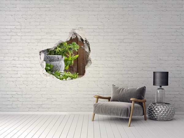 Vinilo adhesivo efecto agujero 3d para casa Un jardín verde en un agujero de hormigón.