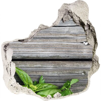 Pegatina pared rota trampantojo decorativo Una pared dañada con piso de madera.