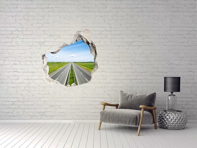 Vinilo decorativo boquete pared irregular Un camino entre vegetación