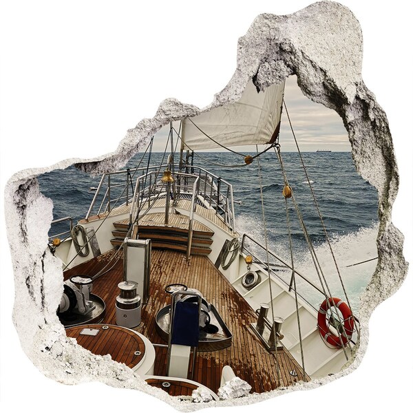 Vinilo decorativo boquete pared irregular Un yate en el mar