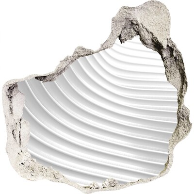 Pegatina efecto 3d pared rota decorativa Una pared rota con una vista de líneas onduladas.