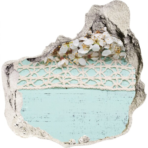 Pegatina efecto 3d pared rota decorativa Motivo floral sobre fondo de madera azul.