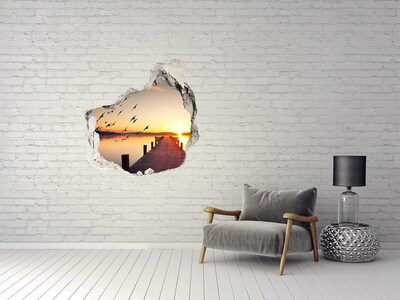 Vinilo decorativo boquete pared irregular Puesta de sol sobre el lago