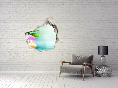 Vinilo adhesivo efecto agujero 3d para casa Un oasis de paz con una flor y una vela.