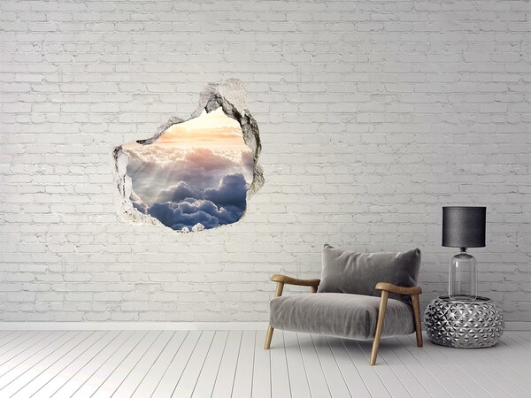 Vinilo decorativo boquete pared irregular El cielo está lleno de nubes.