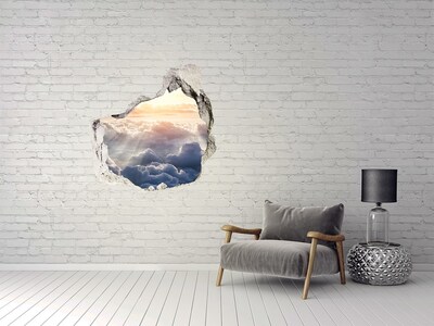 Vinilo decorativo boquete pared irregular El cielo está lleno de nubes.