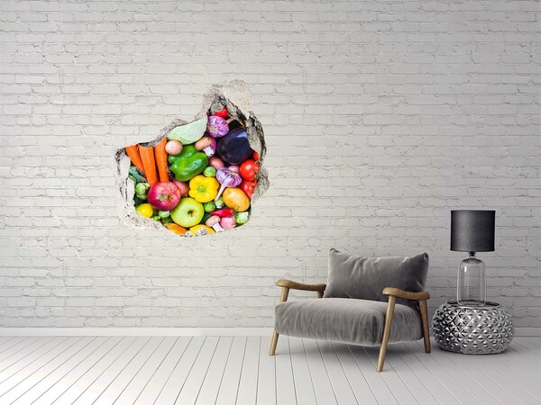 Vinilo decorativo boquete pared irregular Verduras y frutas coloridas en un agujero en la pared.