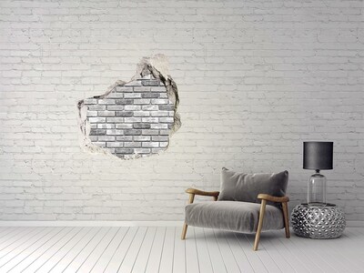 Vinilo decorativo boquete pared irregular Una pared de ladrillos en ruinas