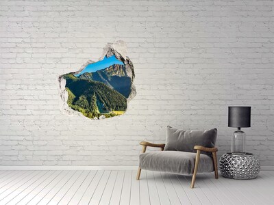 Vinilo decorativo boquete pared irregular Paisaje de montaña con un valle