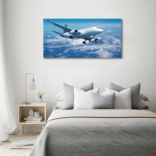 Cuadro metacrilato horizontal Un avión en las nubes