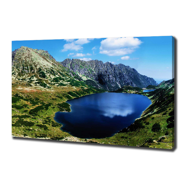 Foto en lienzo con acabado profesional horizontal Un valle en las montañas
