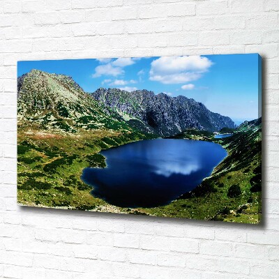 Foto en lienzo con acabado profesional horizontal Un valle en las montañas
