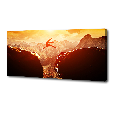 Cuadro canvas con impresión uv duradera horizontal Saltar sobre el abismo
