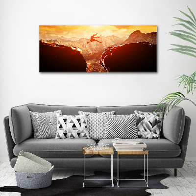Cuadro canvas con impresión uv duradera horizontal Saltar sobre el abismo