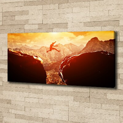Cuadro canvas con impresión uv duradera horizontal Saltar sobre el abismo