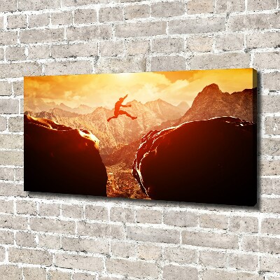 Cuadro canvas con impresión uv duradera horizontal Saltar sobre el abismo