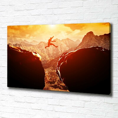 Cuadro canvas con impresión uv duradera horizontal Saltar sobre el abismo