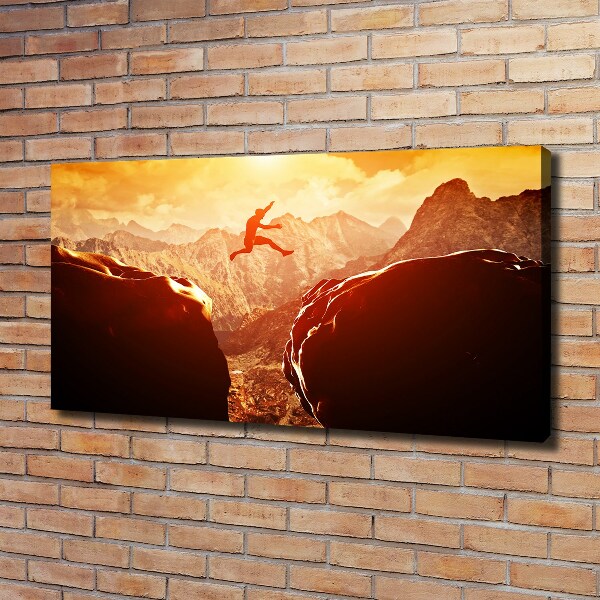Cuadro canvas con impresión uv duradera horizontal Saltar sobre el abismo