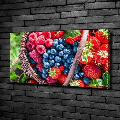 Foto en lienzo con acabado profesional horizontal Una cesta de frutos del bosque