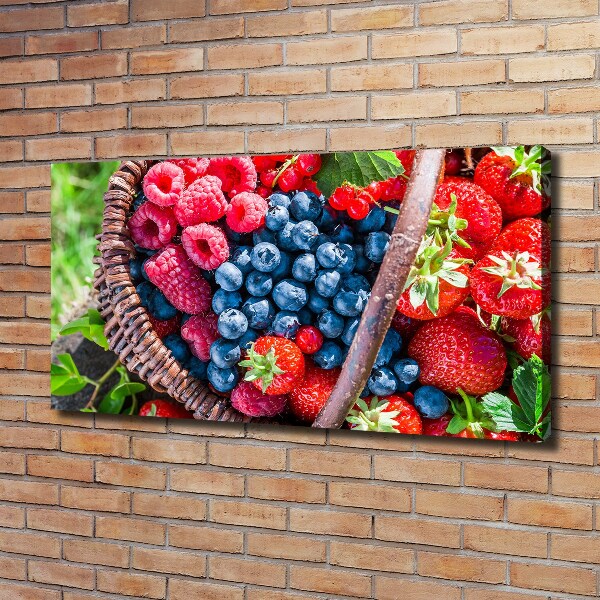 Foto en lienzo con acabado profesional horizontal Una cesta de frutos del bosque