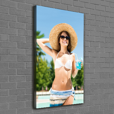 Cuadro canvas decorativo para salón vertical Mujer junto a la piscina