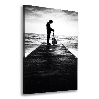 Cuadro canvas decorativo para salón vertical Guitarrista en el muelle