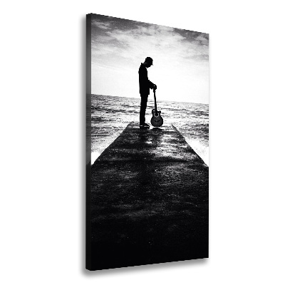 Cuadro canvas decorativo para salón vertical Guitarrista en el muelle