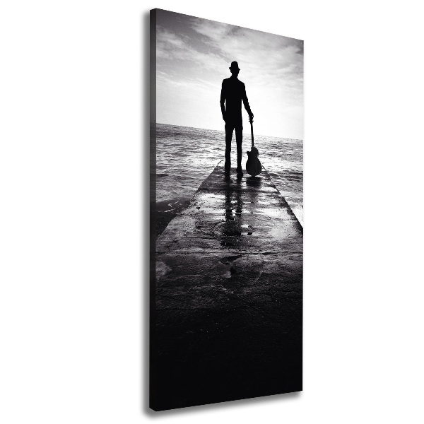 Cuadro moderno en lienzo resistente uv vertical Guitarrista en el muelle