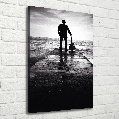 Cuadro moderno en lienzo resistente uv vertical Guitarrista en el muelle