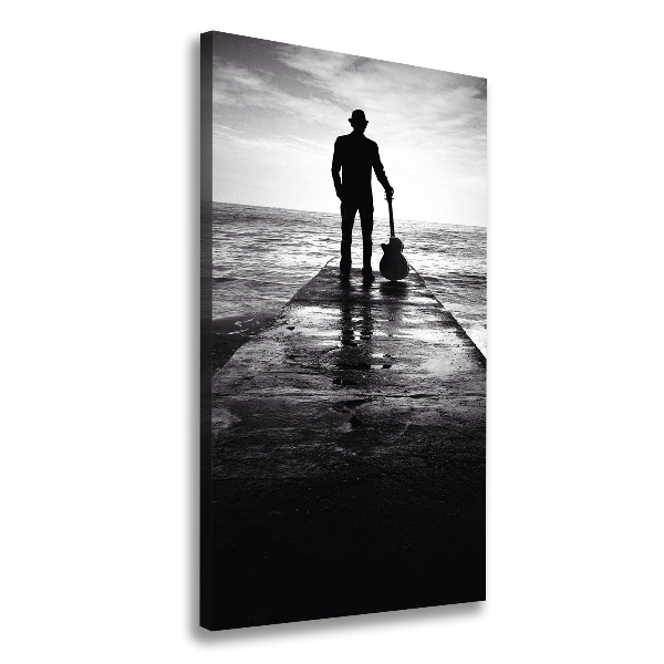 Cuadro moderno en lienzo resistente uv vertical Guitarrista en el muelle