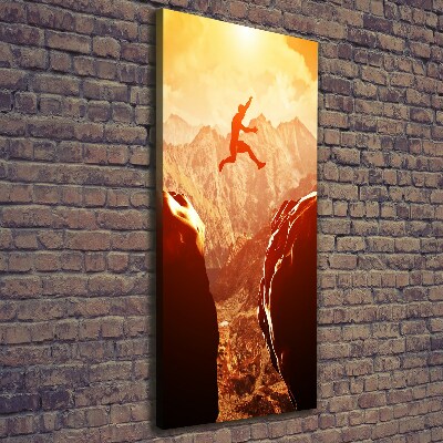 Fotografía en lienzo vertical Saltar sobre el abismo