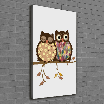 Cuadro canvas decorativo para salón vertical Una pareja de búhos en una rama.