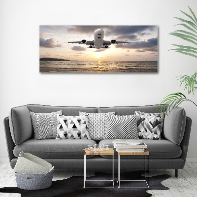 Foto en cristal de alta calidad con impresión uv horizontal Un avión sobre el mar