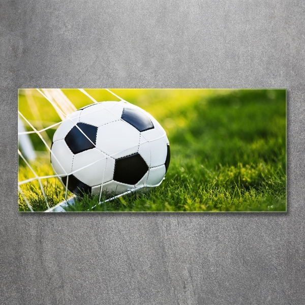 Foto en cristal de alta calidad con impresión uv horizontal El balón está en la portería.