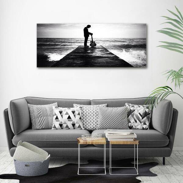 Impresión en cristal con acabado brillante horizontal Guitarrista en el muelle