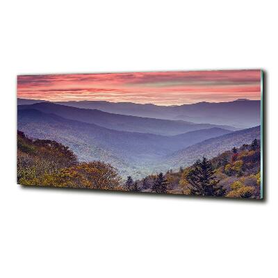 Cuadro de cristal templado moderno horizontal Puesta de sol sobre las montañas