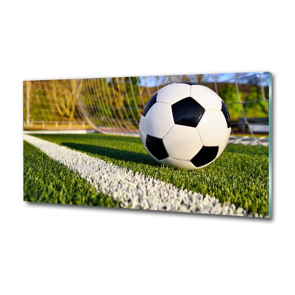 Foto en cristal de alta calidad con impresión uv horizontal El balón está en la portería.