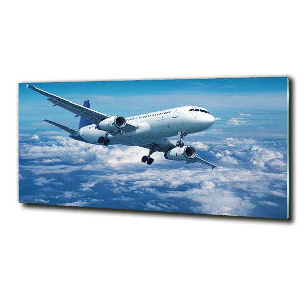 Foto en cristal de alta calidad con impresión uv horizontal Un avión en las nubes