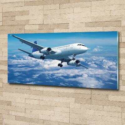 Foto en cristal de alta calidad con impresión uv horizontal Un avión en las nubes