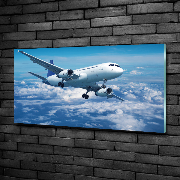 Foto en cristal de alta calidad con impresión uv horizontal Un avión en las nubes