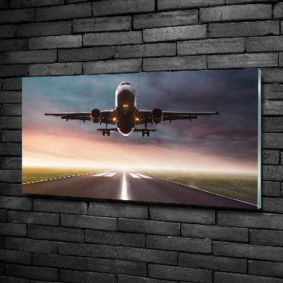 Cuadro decorativo de vidrio para salón horizontal Un avión despegando