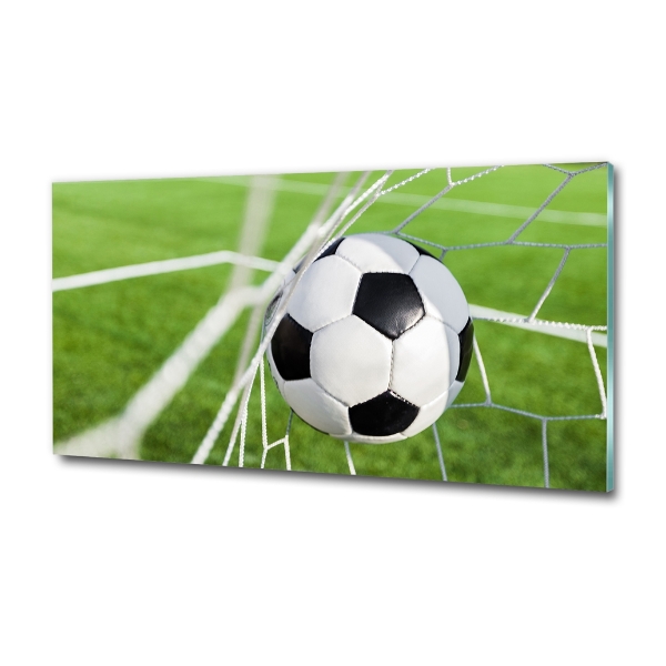 Foto en cristal de alta calidad con impresión uv horizontal El balón está en la portería.