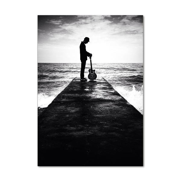 Cuadro de cristal moderno efecto brillo vertical Guitarrista en el muelle
