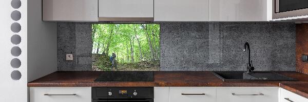 Panel de pared de cocina Ornitólogo en el bosque