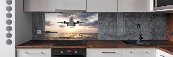 Salpicadero para cocina Un avión sobre el mar