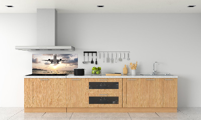 Salpicadero para cocina Un avión sobre el mar