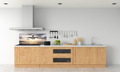 Salpicadero para cocina Un avión sobre el mar