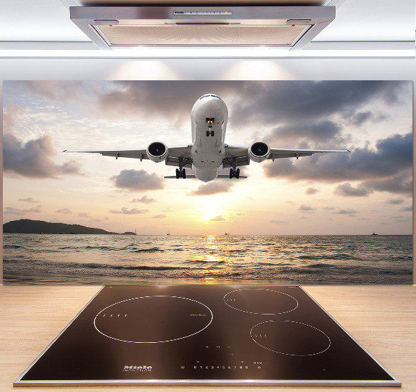 Salpicadero para cocina Un avión sobre el mar